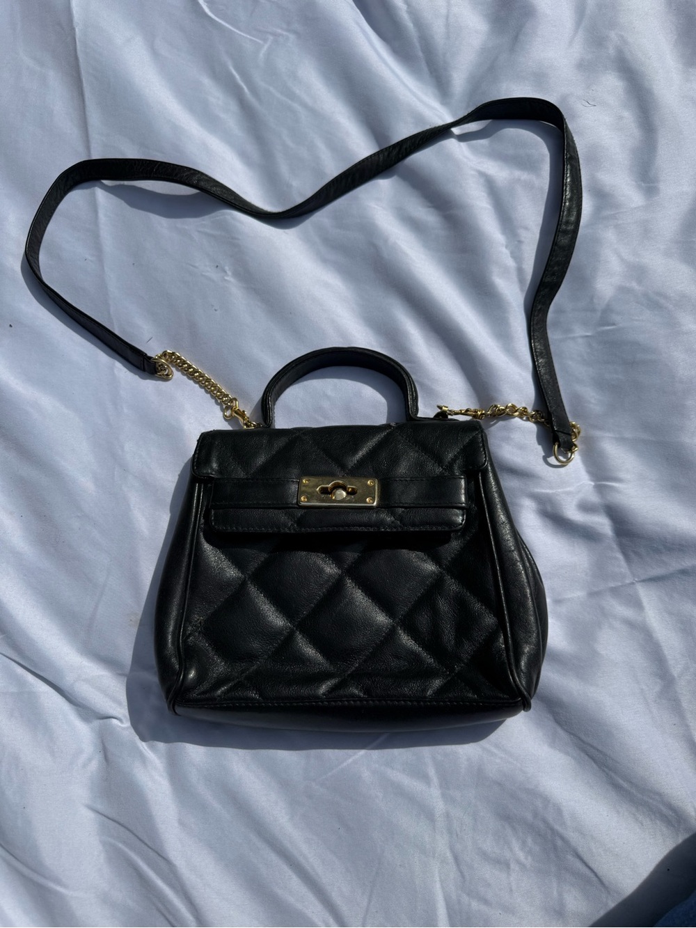 Black Quilted Mini Top-Handle Crossbody Bag with Gold Accent